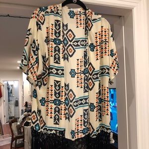 Beautiful Aztec designed top with tastles
